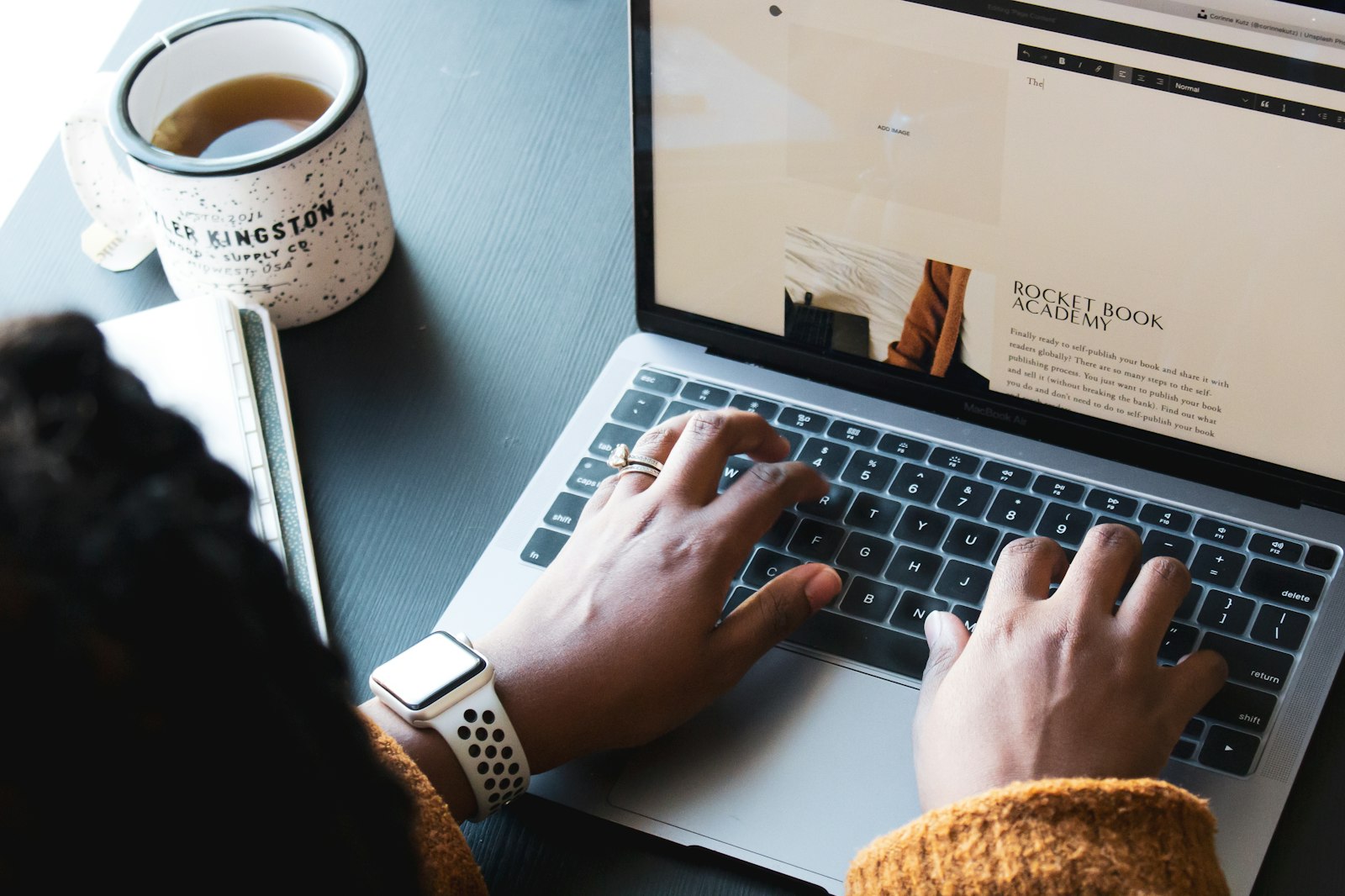 Freelancer reviewing a short-term client CRM dashboard on a laptop, tracking multiple small projects at once